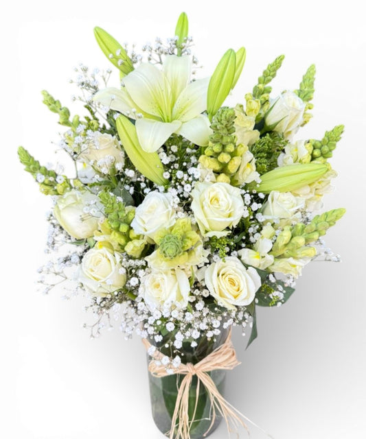 Lily and white rose in vasa