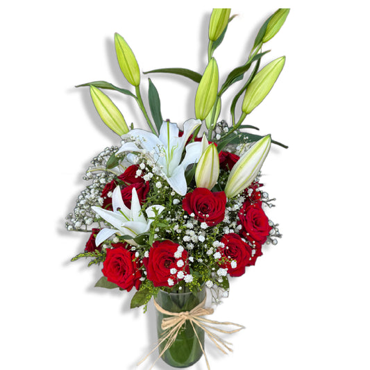 red flowers & lilies in vase