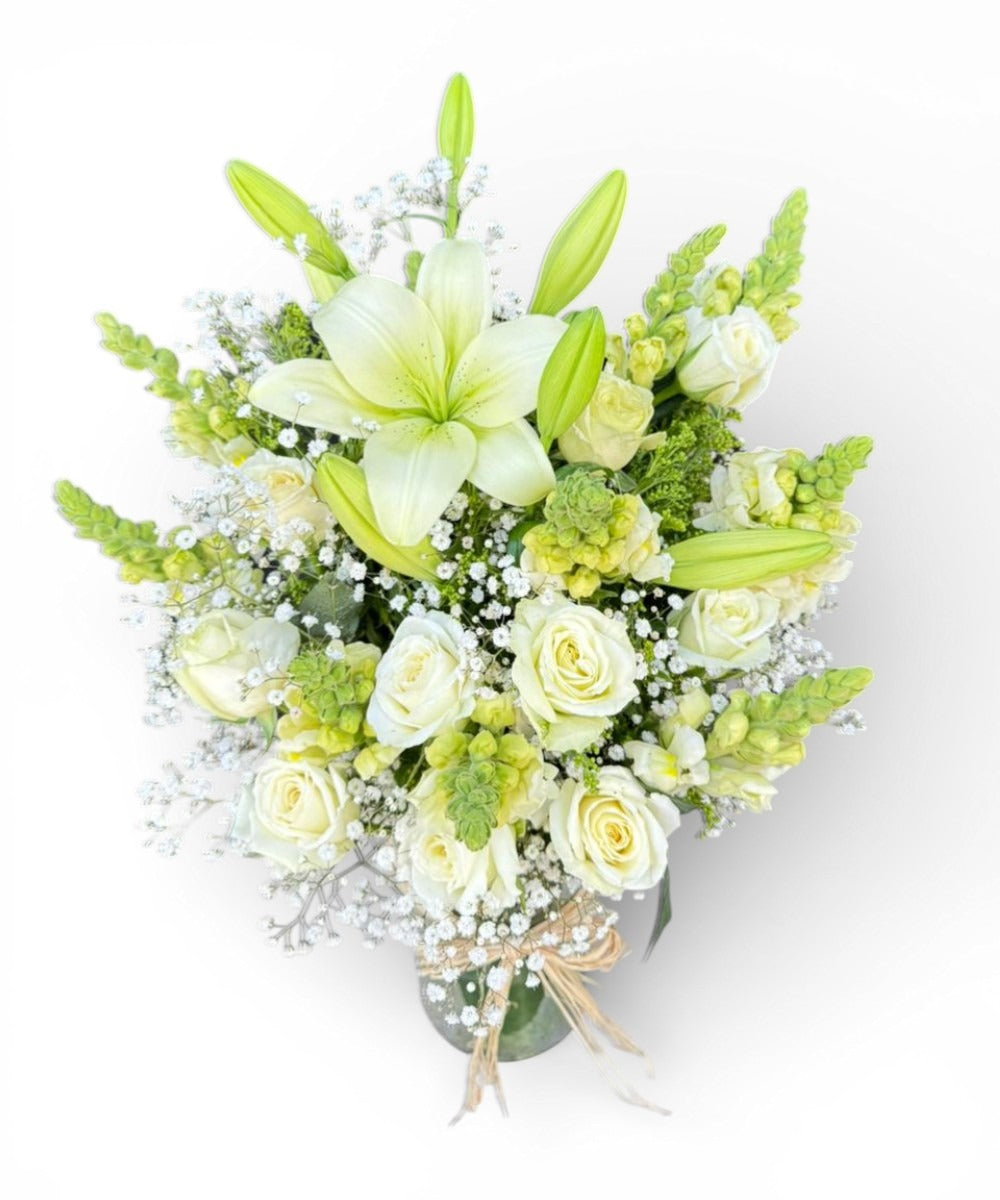 Lily and white rose in vasa