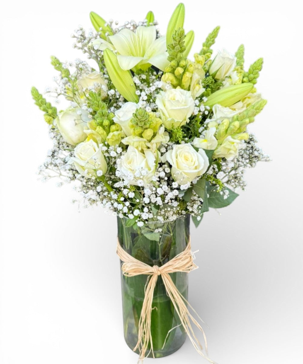 Lily and white rose in vasa