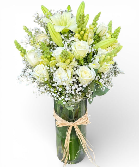 Lily and white rose in vasa