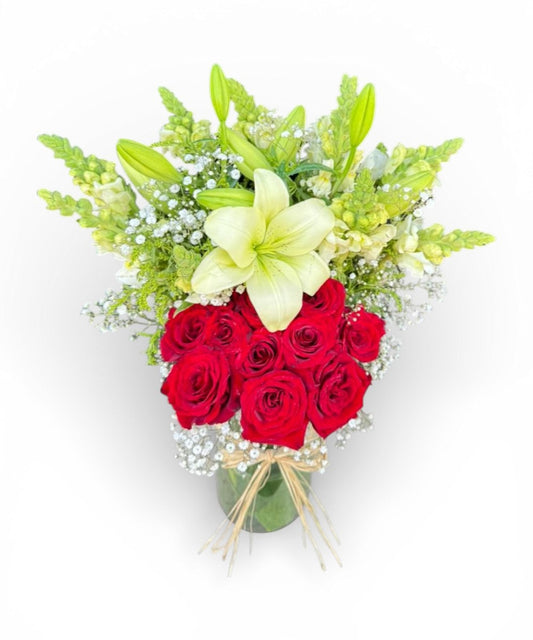 Lily, a red rose in a vase